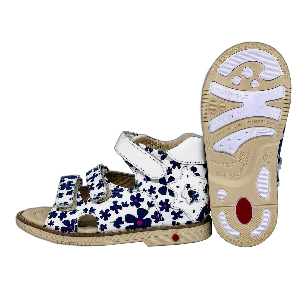 Photo of orthopedic sandals for girls in white color adorned with navy flowers, featuring arch and ankle support for comfort and stability.