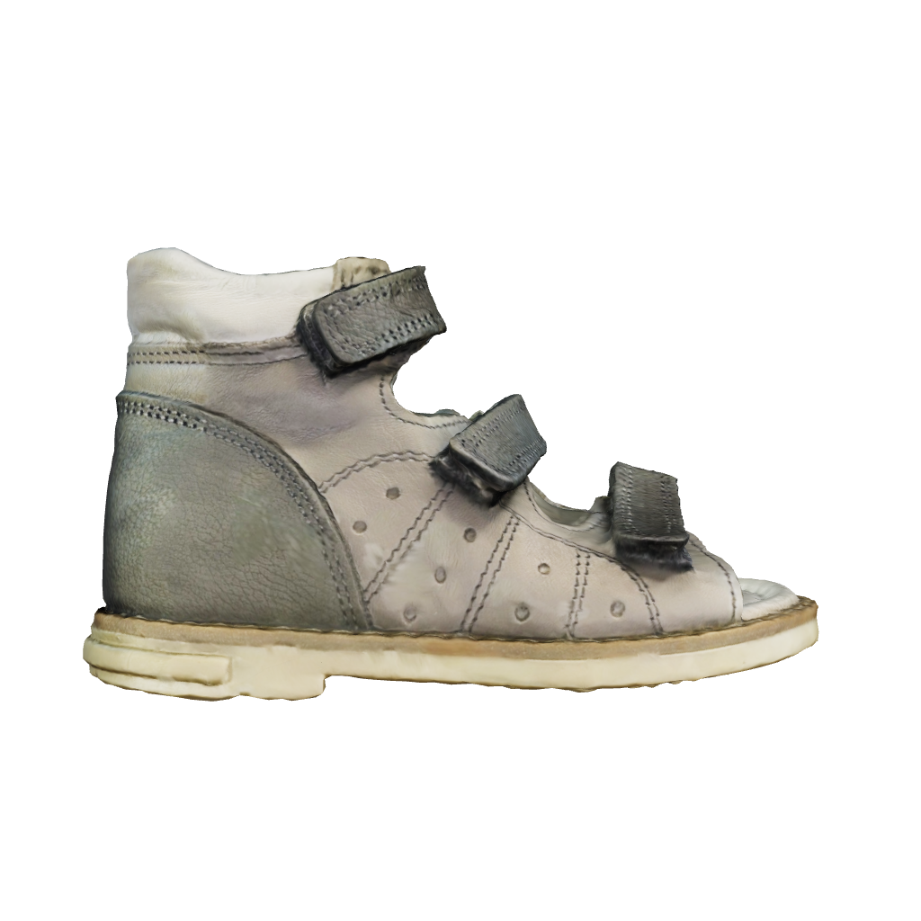 3D model showcasing our kids orthopaedic sandals in Grey. Detailed view highlighting the arch and ankle support, and Thomas heels for optimal foot health. Perfect for active little ones enjoying comfort and style.