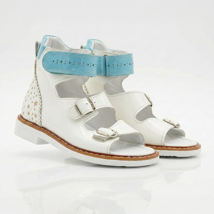 Ortho Shoes white orthopedic sandals for kids with blue perforated ankle straps, gold stars, and Thomas heels.