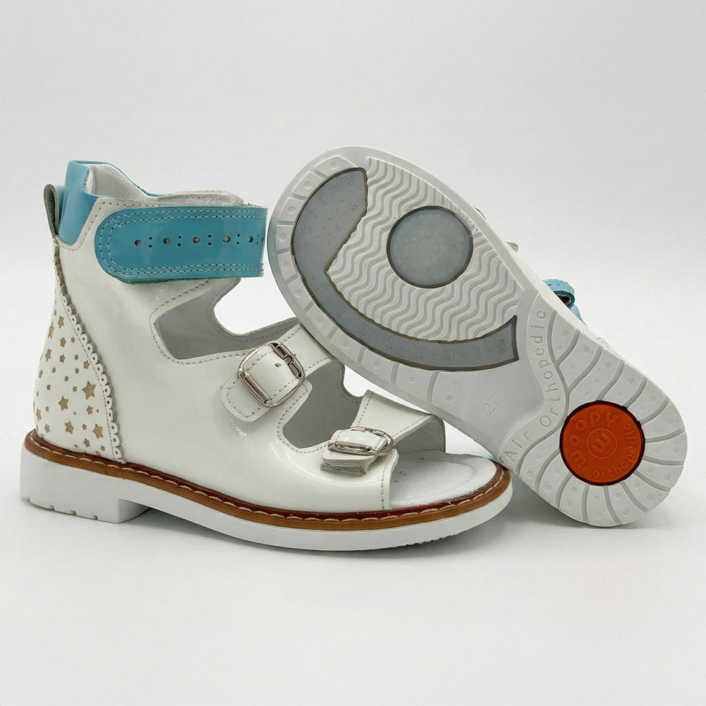 Supportive children’s orthopedic sandals with buckle straps, ankle and arch support, Thomas heels, and ‘Air Orthopedic’ sole branding.