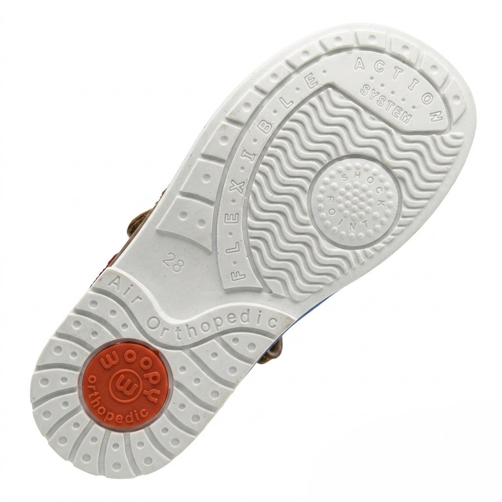 Shock-absorbing orthopaedic sole with built-in Thomas heel and impact absorption point for active boys.