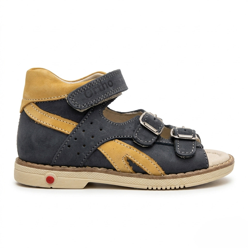 Children’s dark grey orthopedic sandals with yellow accents, multi‑strap, arch and ankle support, and rugged sole with Thomas heels by Ortho Shoes.