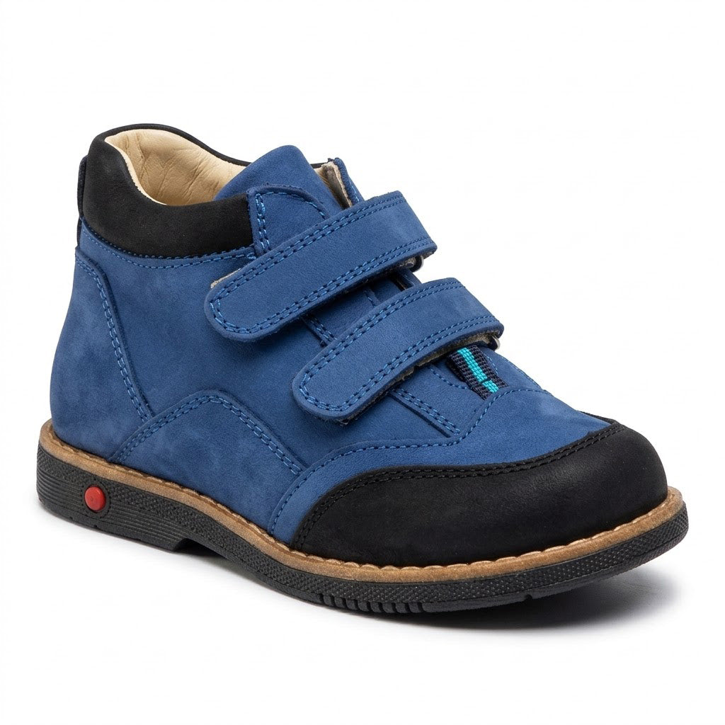 Boys blue orthopaedic boots featuring padded ankle collars, reinforced black toe cap, and Thomas heel.