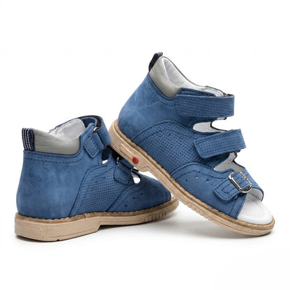 Profile of boys blue leather sandals showing structured ankle support, micro-perforations, and a Thomas heel.