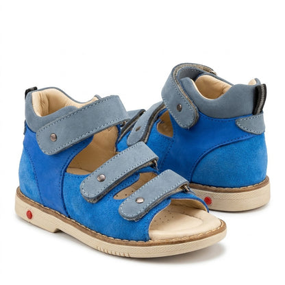Blue nubuck orthopaedic sandals showing padded mid-top collar, firm heel counter, and sturdy Thomas heel