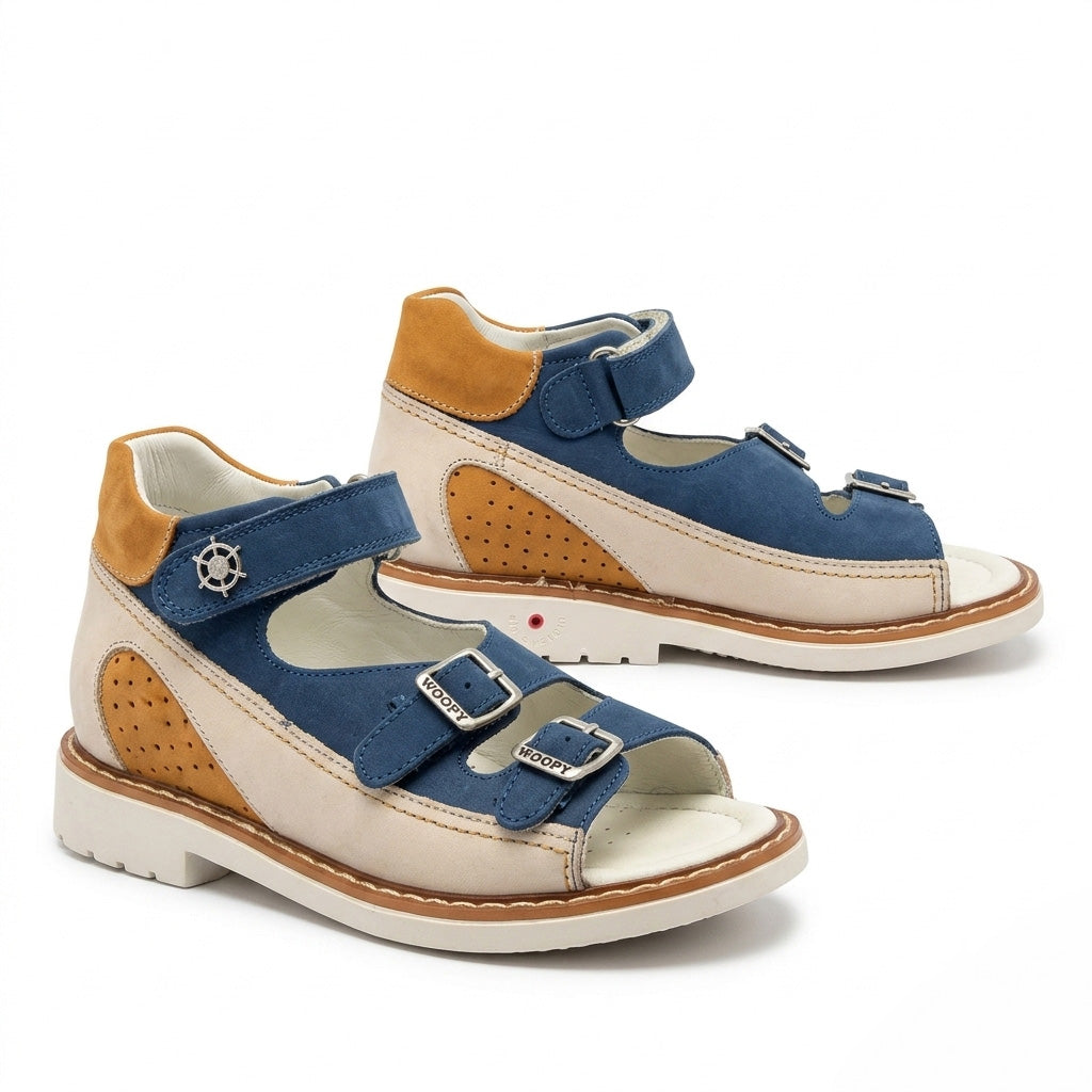 Kids orthopaedic sandals in matte blue and beige leather with structured arch support and three straps.