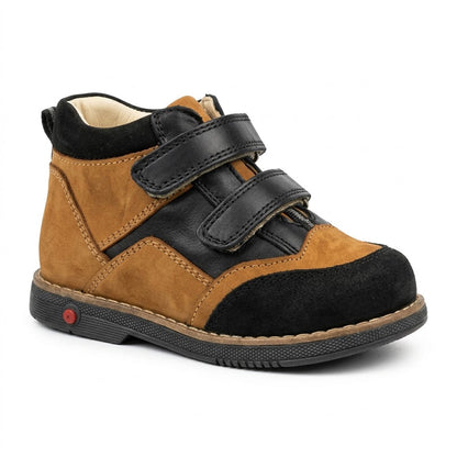 Side view of boys' nubuck and leather orthopaedic boots featuring double Velcro straps and supportive Thomas heels.