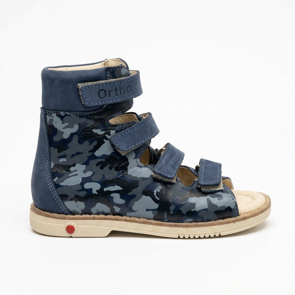 High-top navy camo orthopaedic sandals with padded ankle collar, hook-and-loop straps, and supportive Thomas heel.