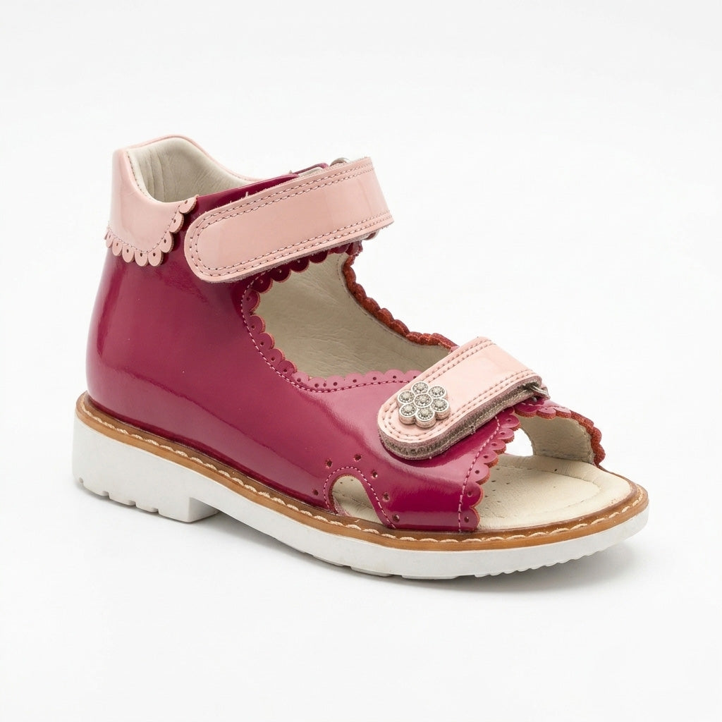 Mid-top fuchsia leather girls sandals with extended Thomas heel, padded pink collar, and sturdy white traction sole