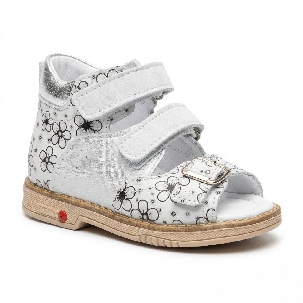 Profile of girls silver floral leather sandals showing a mid-top ankle collar and adjustable straps.