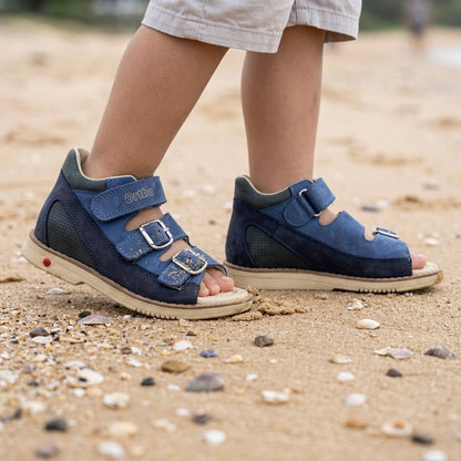 Boys orthopaedic mid-top sandals in navy nubuck leather with arch and ankle support, adjustable straps, tan sole
