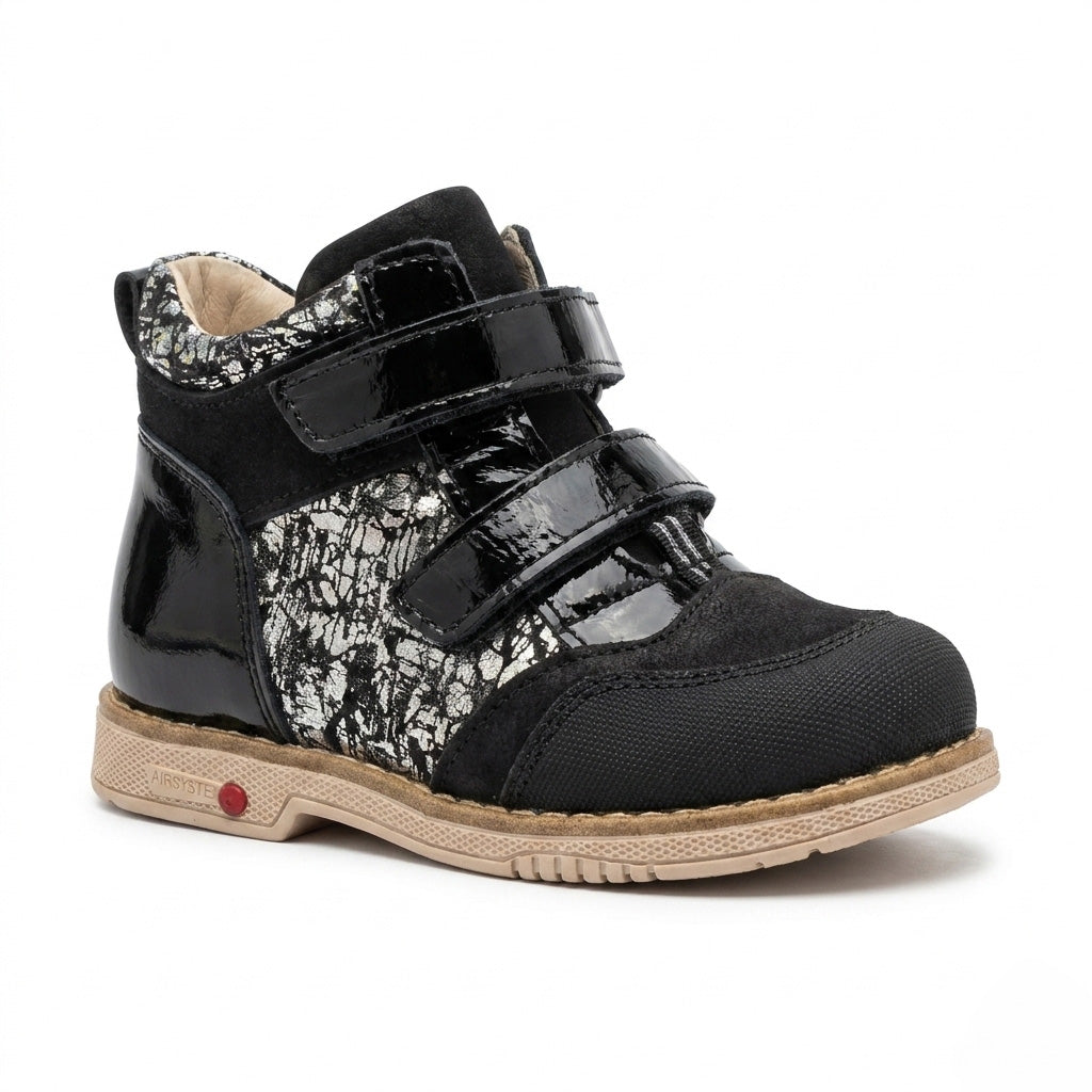 Profile of girls black nubuck and silver crackle leather boots showing a protective toe cap.