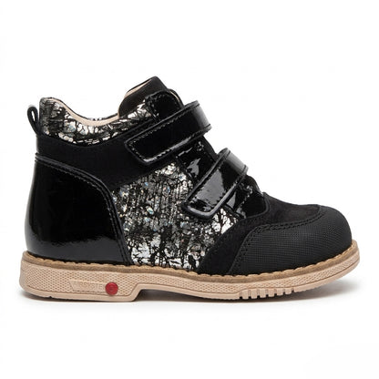 Profile of girls black nubuck and silver crackle leather boots showing a protective toe cap.