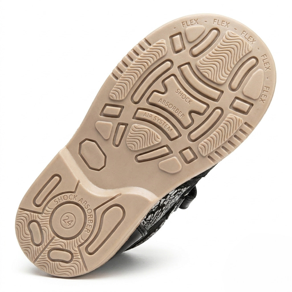 Profile of girls black nubuck and silver crackle leather boots showing a protective toe cap.