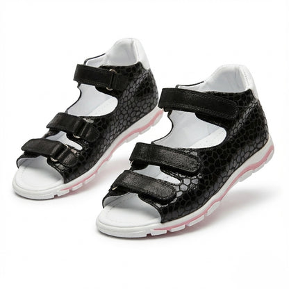 Orthopaedic black orthopedic sandals with three Velcro straps, open toe design, arch support, and ankle support.