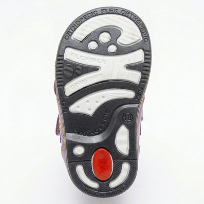 Kids’ purple orthopedic boots with Velcro straps, arch support, ankle stability, Thomas heels, and cushioned tan soles.