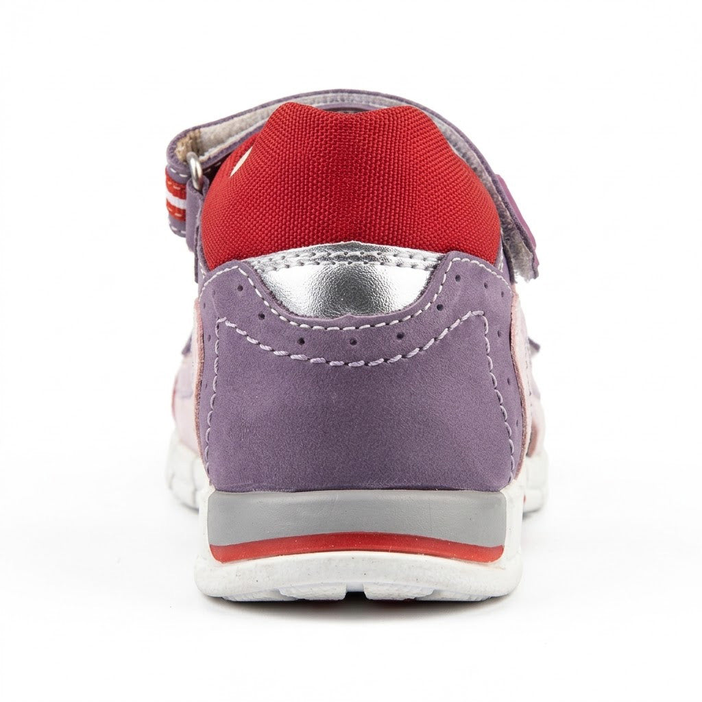 Profile of low-top girls' orthopaedic sandals with structured ankle counter and gripped sole.