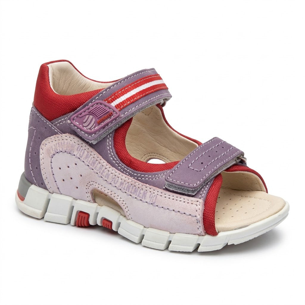 Profile of low-top girls' orthopaedic sandals with structured ankle counter and gripped sole.