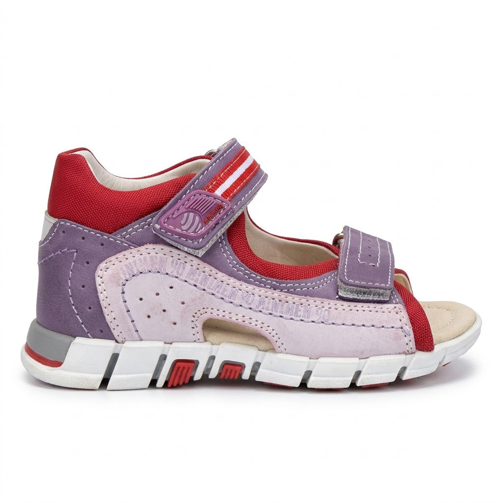 Profile of low-top girls' orthopaedic sandals with structured ankle counter and gripped sole.