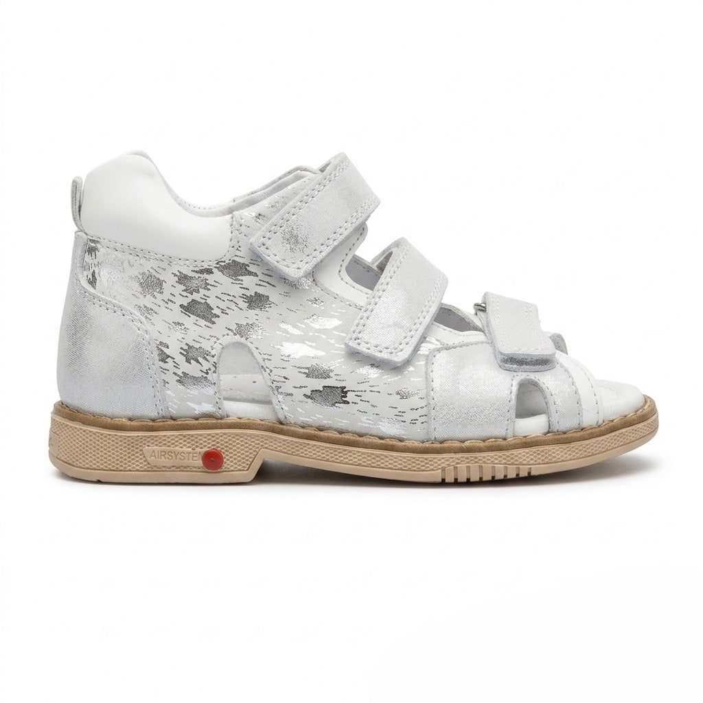 Profile of girls silver leather sandals featuring structured ankle support, built-in arch cushion, and Thomas heel.