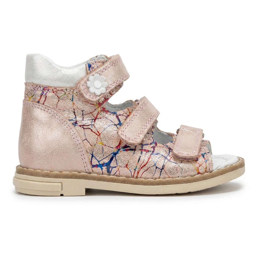 Side view of shimmer pink leather mid top sandals with padded collar and structured ankle support.