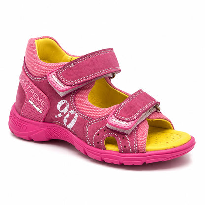 Bright pink low-top orthopaedic sandal with padded collar, white stitching, and reinforced heel counter