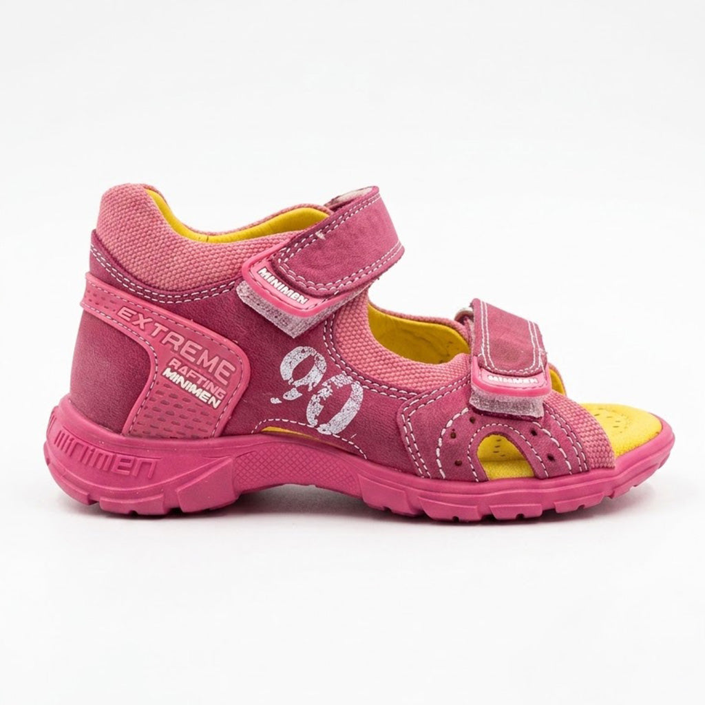Bright pink low-top orthopaedic sandal with padded collar, white stitching, and reinforced heel counter