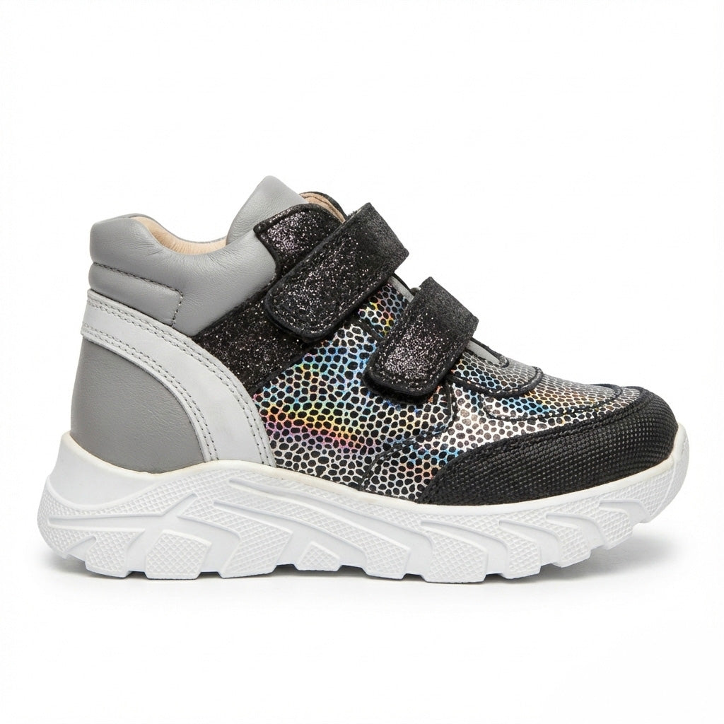 Kids’ mid-top orthopedic sneakers with Velcro straps, arch and ankle support, chunky sole, and silver-black design by Ortho Shoes.