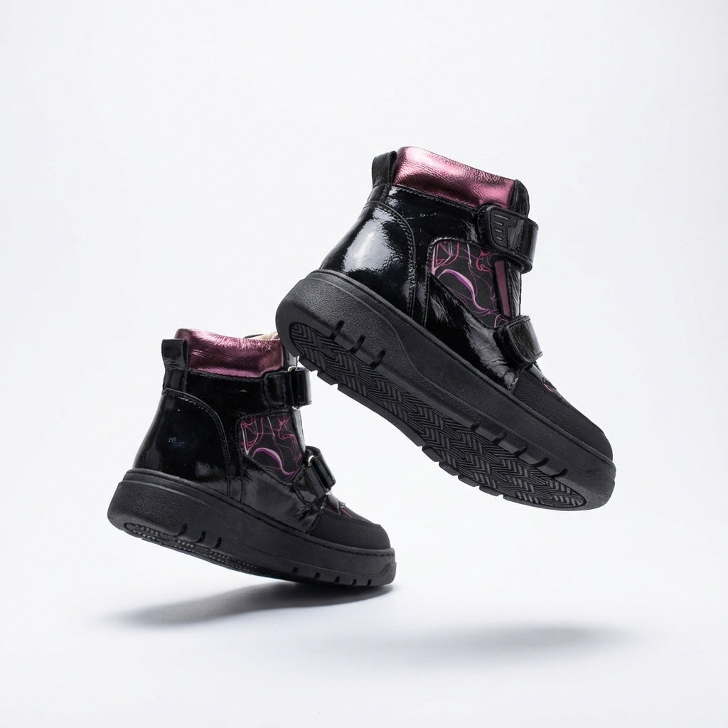 Children’s orthopedic high-top shoes in black and purple with Velcro straps, arch and ankle support, and bold design by Ortho Shoes.