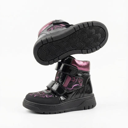 Children’s orthopedic high-top shoes in black and purple with Velcro straps, arch and ankle support, and bold design by Ortho Shoes.