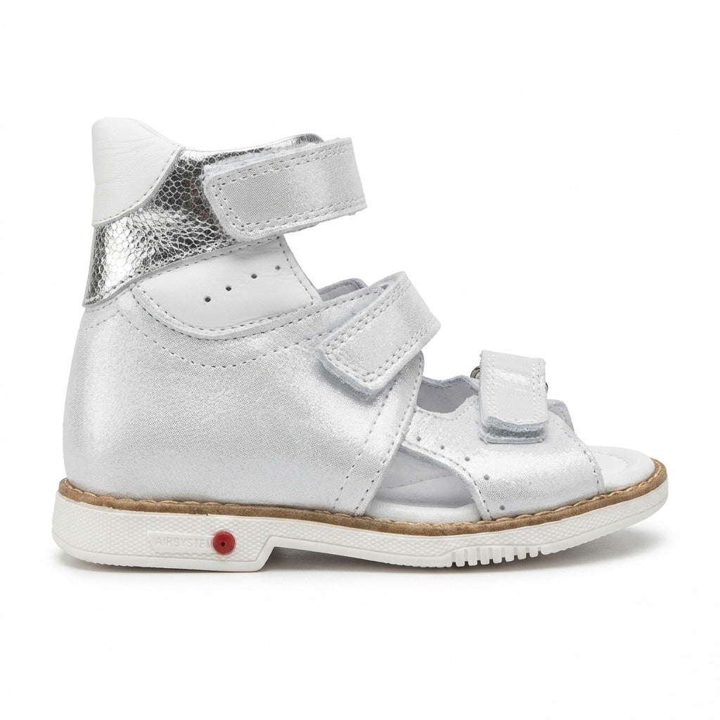 Profile of girls high-top silver leather sandals showing sturdy ankle stability and a Thomas heel.
