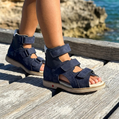 Kids orthopaedic high top sandals in navy nubuck with three Velcro straps and structured ankle support.