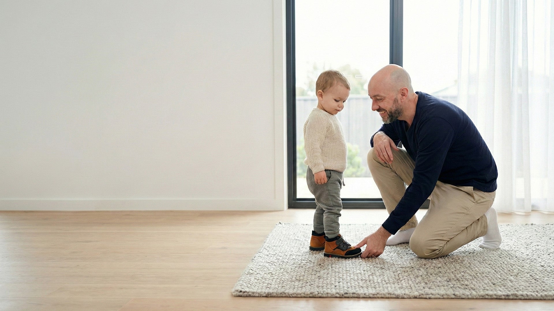 Professional orthopaedic shoe fitting for a toddler during a Perth metro home or clinic visit, checking correct size and comfort.
