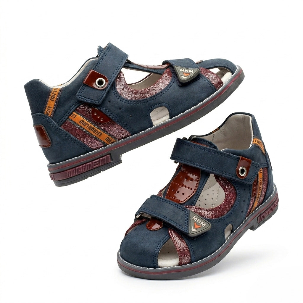 Children’s navy brown orthopedic sandal with Velcro straps, closed‑toe design, arch and ankle support featuring Thomas heels by Minimen.