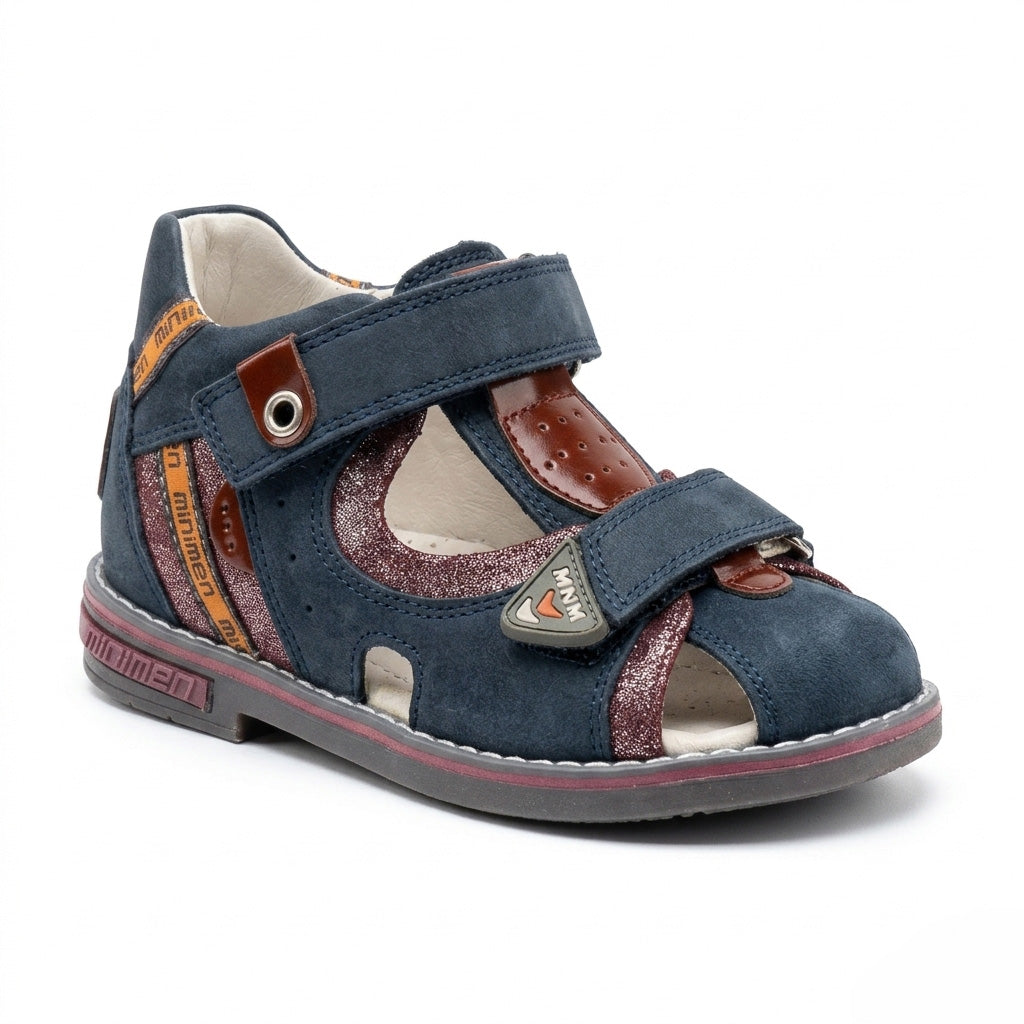 Children’s navy brown orthopedic sandal with Velcro straps, closed‑toe design, arch and ankle support featuring Thomas heels by Minimen.