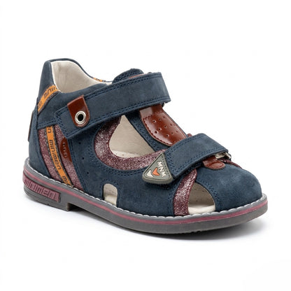 Children’s navy brown orthopedic sandal with Velcro straps, closed‑toe design, arch and ankle support featuring Thomas heels by Minimen.