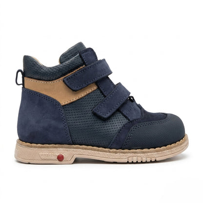 Side view of Oliver Navy Brown boys orthopaedic boot showing the extended Thomas heel and structured cream sole by Ortho Shoes.