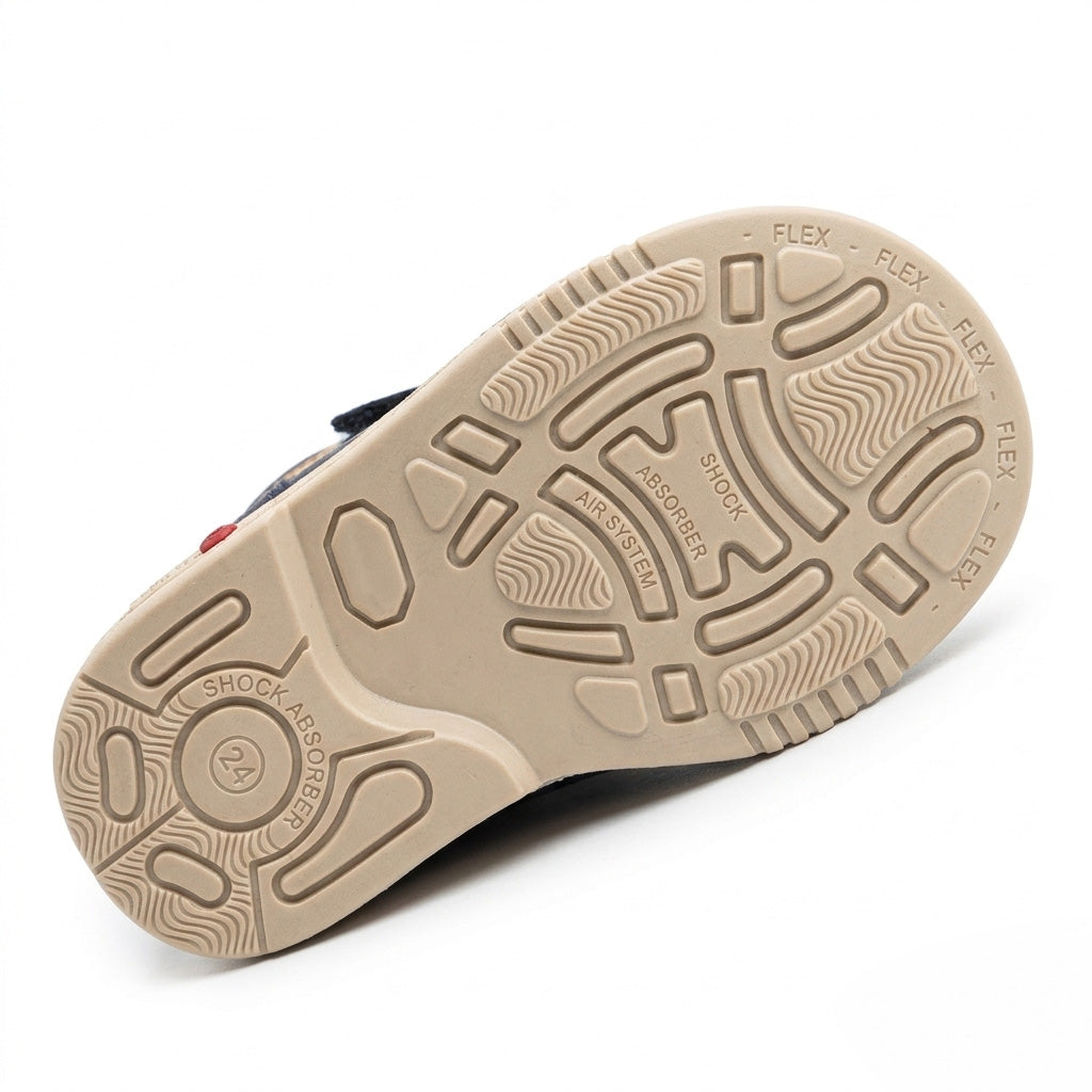 Textured cream sole of Oliver orthopaedic boot highlighting the shock absorber grid and sturdy traction.