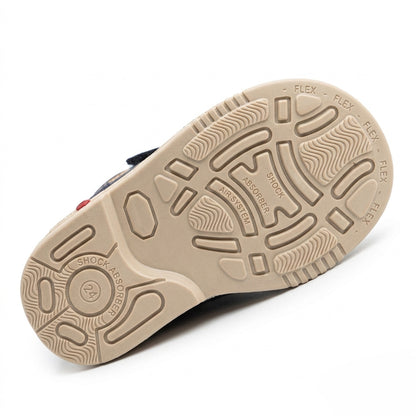 Textured cream sole of Oliver orthopaedic boot highlighting the shock absorber grid and sturdy traction.