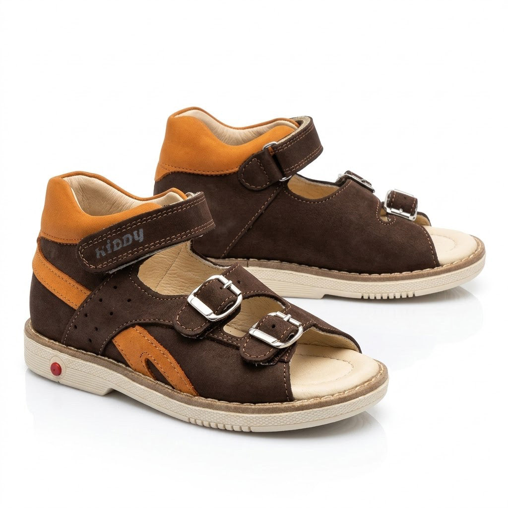 Mid-top boys orthopaedic sandals showing padded orange collar, Thomas heel, and buckle straps.