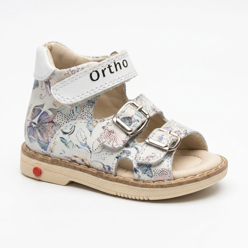 Profile of girls mid-top leather sandals showing a high back for ankle support and an Ortho branded hook-and-loop ankle strap.