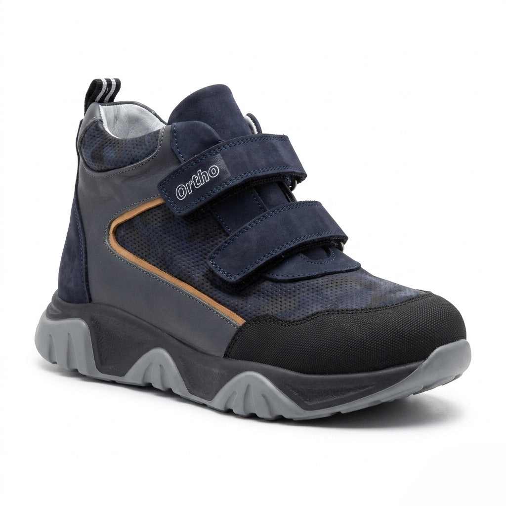 Kids orthopedic boots in dark blue with Velcro straps, rugged grey sole, arch and ankle support, and Ortho branding.