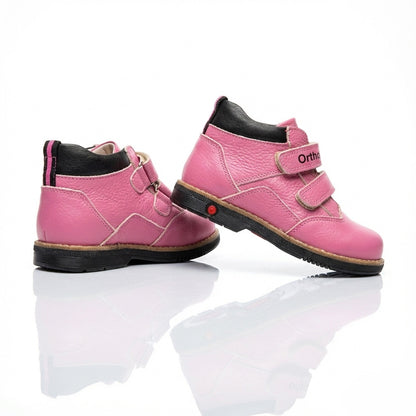 Supportive pink orthopedic boots for girls with Velcro straps, arch and ankle support, rugged sole, and Ortho branding.