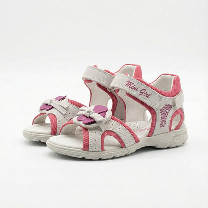 Girls’ orthopedic sandals with arch and ankle support, floral strap design, and rhinestone accents by Minimen.