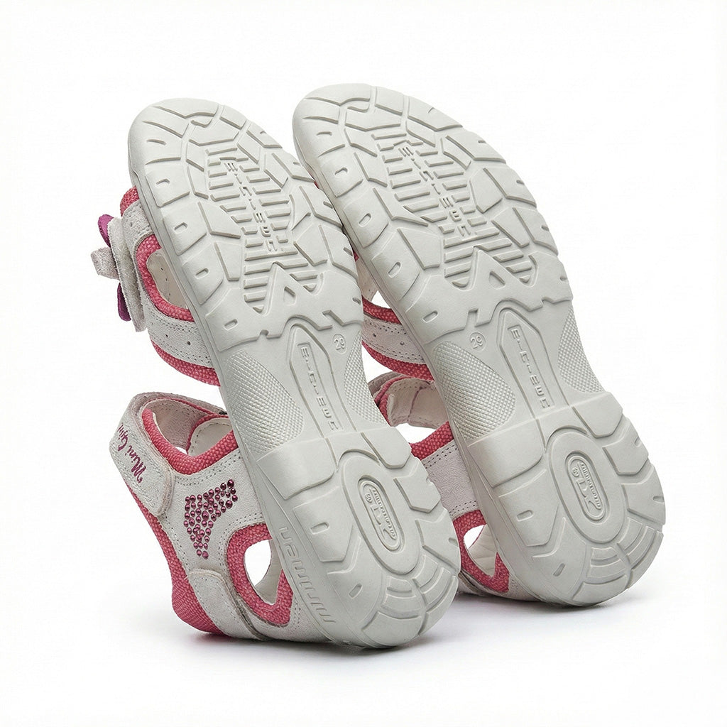 Girls’ orthopedic sandals with arch and ankle support, floral strap design, and rhinestone accents by Minimen.