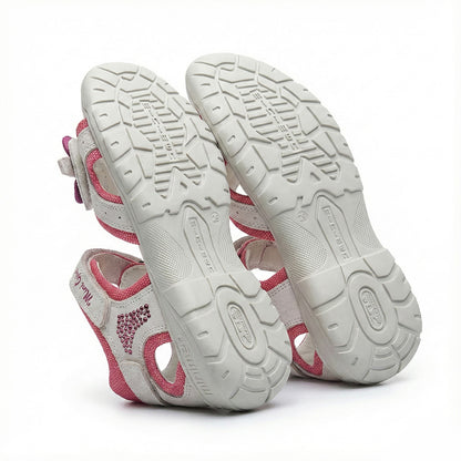 Girls’ orthopedic sandals with arch and ankle support, floral strap design, and rhinestone accents by Minimen.