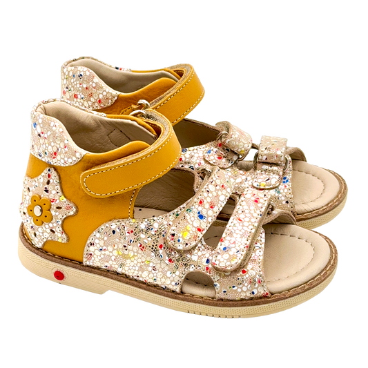 Kids orthopedic sandals in sunny yellow adorned with a silver mosaic pattern, designed with arch and ankle support and Thomas heels, made by Ortho Shoes Australia.