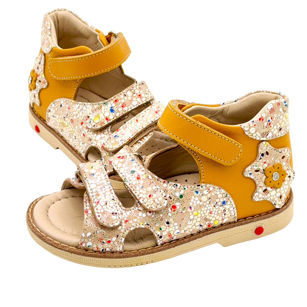 Kids orthopedic sandals in sunny yellow adorned with a silver mosaic pattern, designed with arch and ankle support and Thomas heels, made by Ortho Shoes Australia.