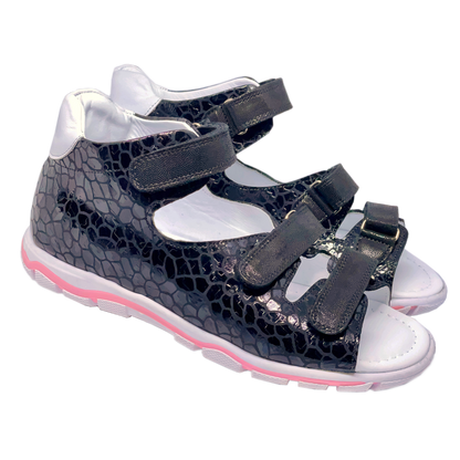 Black sandals for teenage girls with three straps, arch and ankle support. Stylish and comfortable orthopedic footwear.
