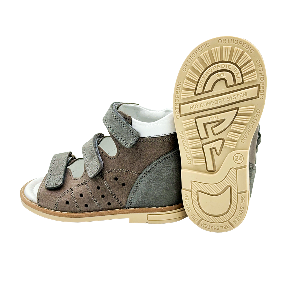 Photo of kids' orthopaedic sandals in dark grey, featuring arch and ankle support, and Thomas heels.